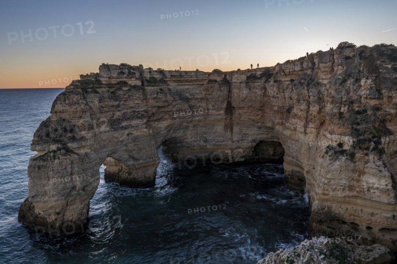 Sunset at Praia da Marinha, rocks and cliffs, steep coast in the Algarve, Portugal, Europe