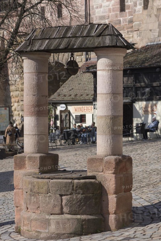 Historical draw well, Tirgaertnertorplatz, Nuremberg, Middle Franconia, Bavaria, Germany, Europe