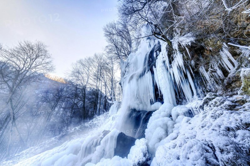 Icicles at the waterfall, permafrost with icy landscape, Swabian Alb, Bad Urach, Baden-Wuerttemberg, Germany, Europe