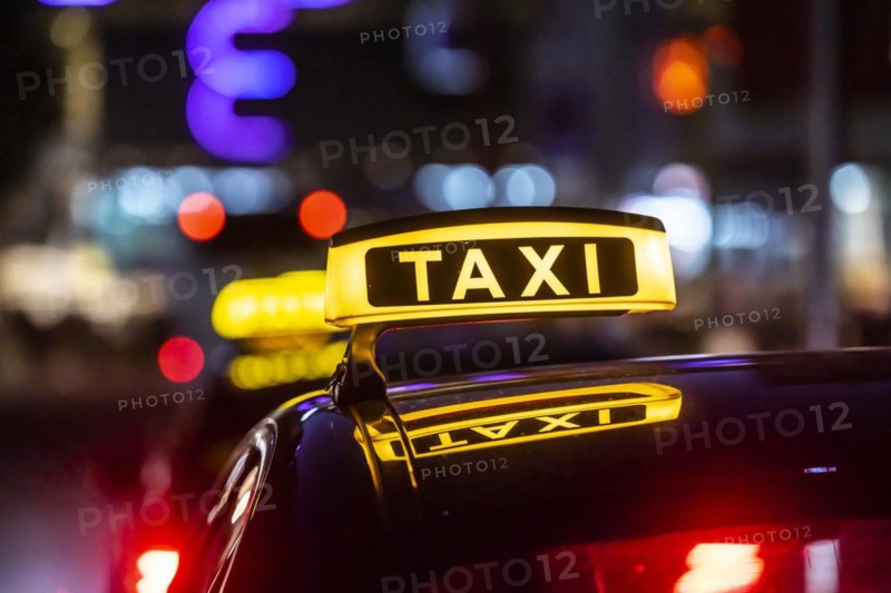 Taxi stand with taxi in the city centre at night, symbol photo, Stuttgart, Baden-Wuerttemberg, Germany, Europe