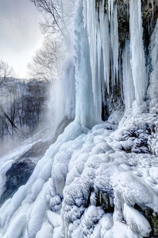 Icicles at the waterfall, permafrost with icy landscape, Swabian Alb, Bad Urach, Baden-Wuerttemberg, Germany, Europe