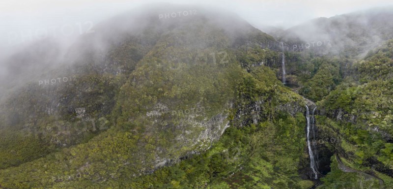 Aerial view, Lagoa do Vento with Upper Risco waterfall, forest and fog, Rabacal, Madeira, Portugal, Europe