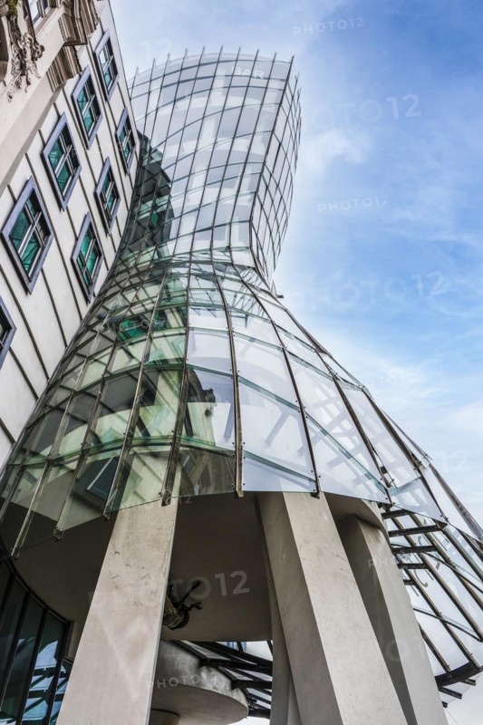 The Dancing House is the name of this building located in Prague, Czech Republic and designed by the Croatian-Czech architect Vlado Milunic in cooperation with Canadian-American architect Frank Gehry