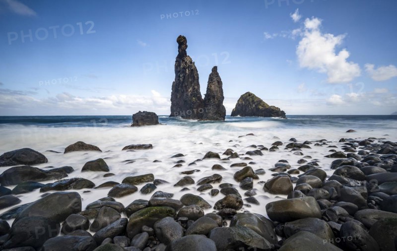Long exposure, beach with volcanic rock, rock formation Ilheus da Rib and Ilheu da Ruama in the sea, Praia da Ribeira da Janela, Madeira, Portugal, Europe