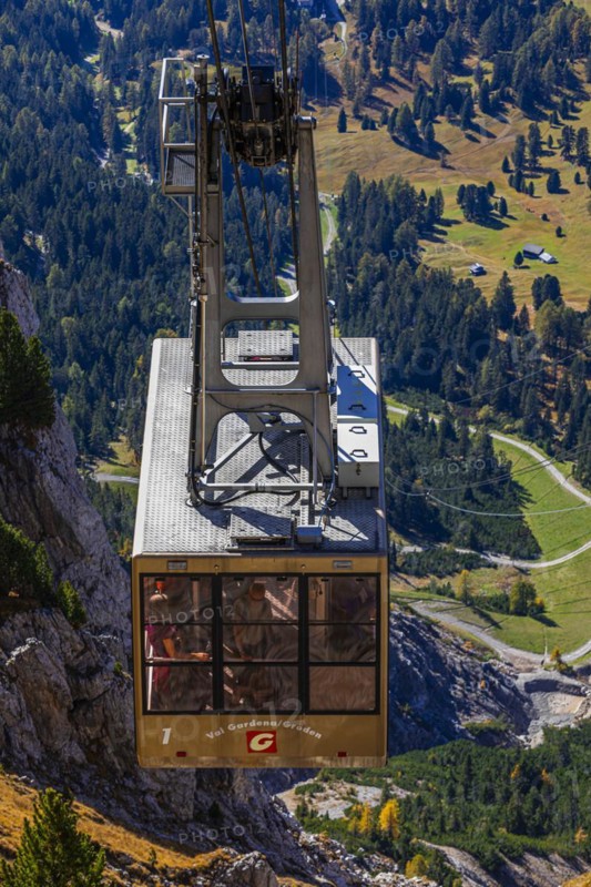 Cable car gondola in front of the entrance to the mountain station at the Seceda summit, Val Gardena, Dolomites, South Tyrol, Italy, Europe