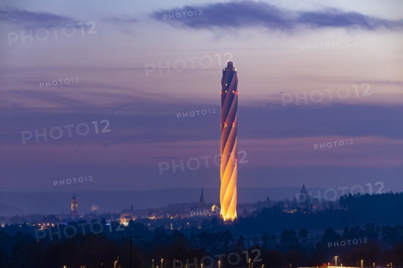 Test tower of TK-Elevator in the early morning. Express and high-speed lifts are tested in the 246-metre-high tower. Behind it, the city with its historic towers and churches. Rottweil, Baden-Wuerttemberg, Germany, Europe