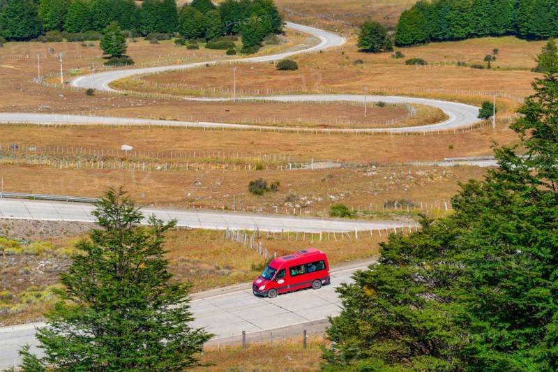 Red van in the Curvas del Diablo, serpentines of the Carretera Austral, also Panamericana, Cerro Castillo National Park, Aysen, Patagonia, Chile, South America