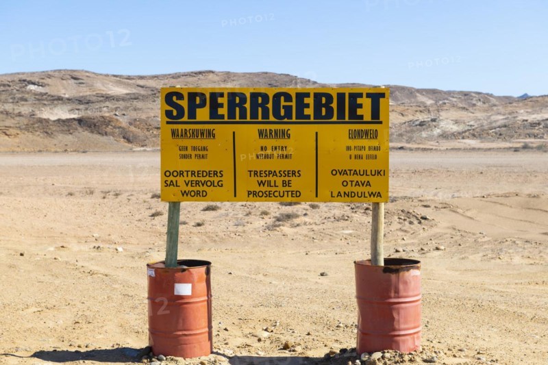 Warning sign at the diamond exclusion zone in the Sperrgebiet National Park, also Tsau ÇKhaeb National Park, Namibia, Africa