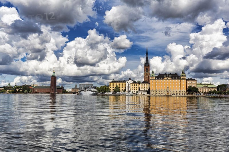 View over the Riddarfjaerden to the city hall and the church Riddarholmskyrkan, skyline of the old town, Stockholm, Maelaren, Sweden, Europe