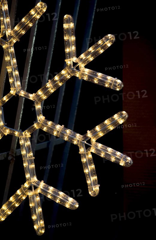 Christmas and party lights in the shape of a snowflake