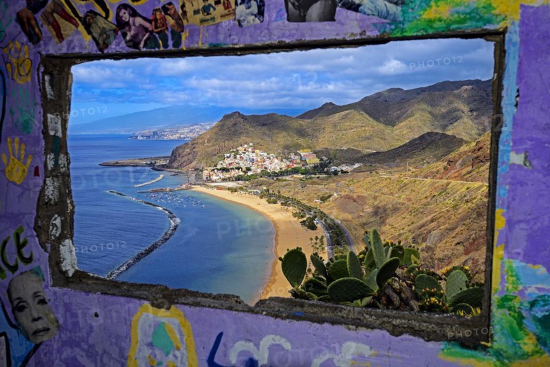 Playa de las Teresitas beach, seen through a ruin, graffiti, San Andres, back of Santa Cruz, Tenerife, Canary Islands, Spain, Europe