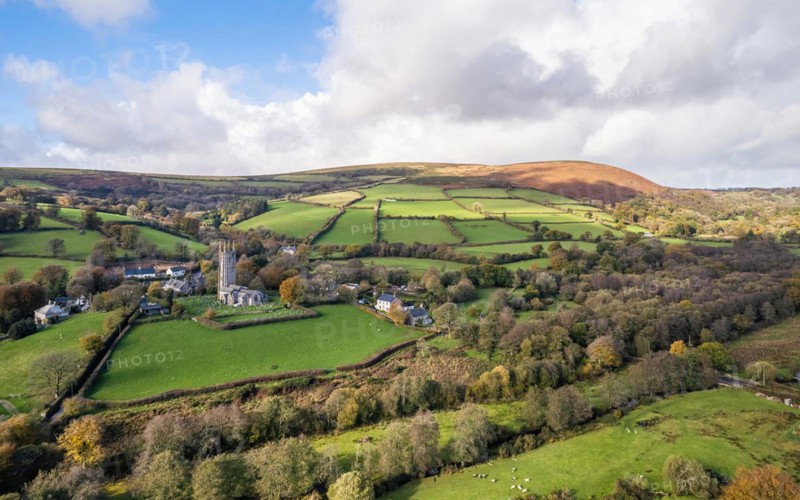 St Pancras Church in Widecombe in the Moor from a drone, Haytor Rocks, Dartmoor National Park, Devon, England, United Kingdom, Europe