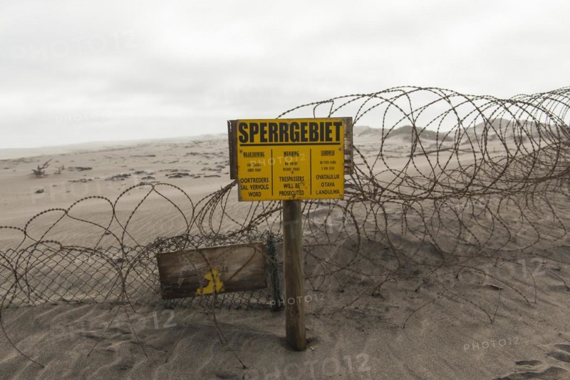 Warning sign at the diamond exclusion zone in the Sperrgebiet National Park, also Tsau ÇKhaeb National Park, Namibia, Africa