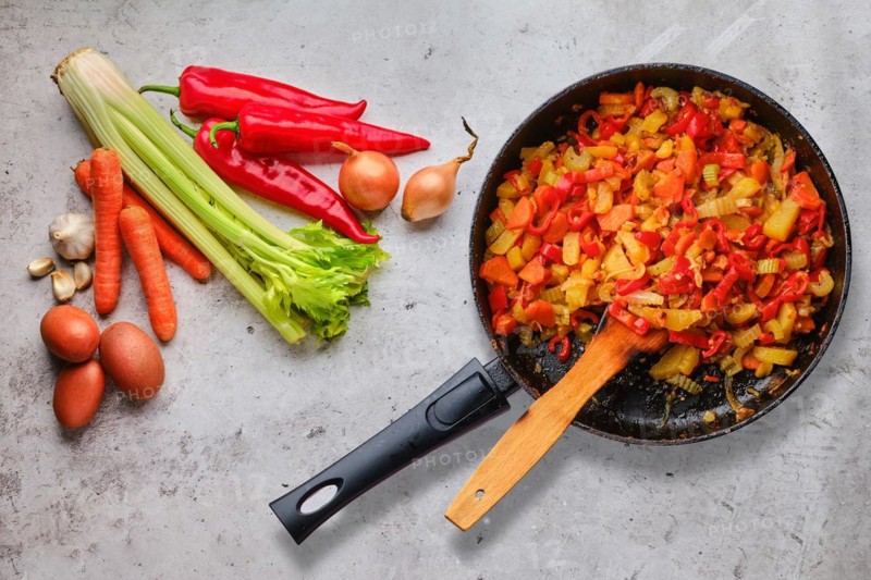 Top view of raw ingredients and ready to eat vegetable ragout