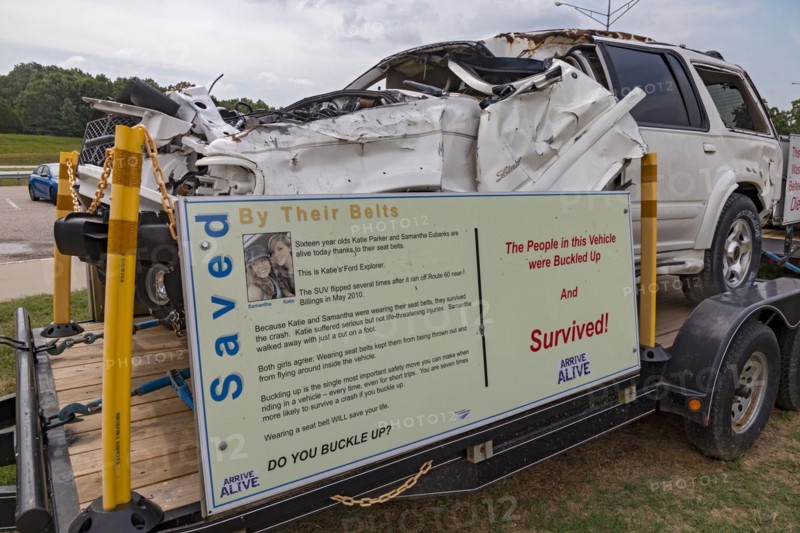 Conway, Missouri, An auto safety display at a rest area on Interstate 44 promotes the use of seat belts. Two cars that crashed are shown: the passengers in one car who wore seat belts survived, the unbelted driver of the other car died