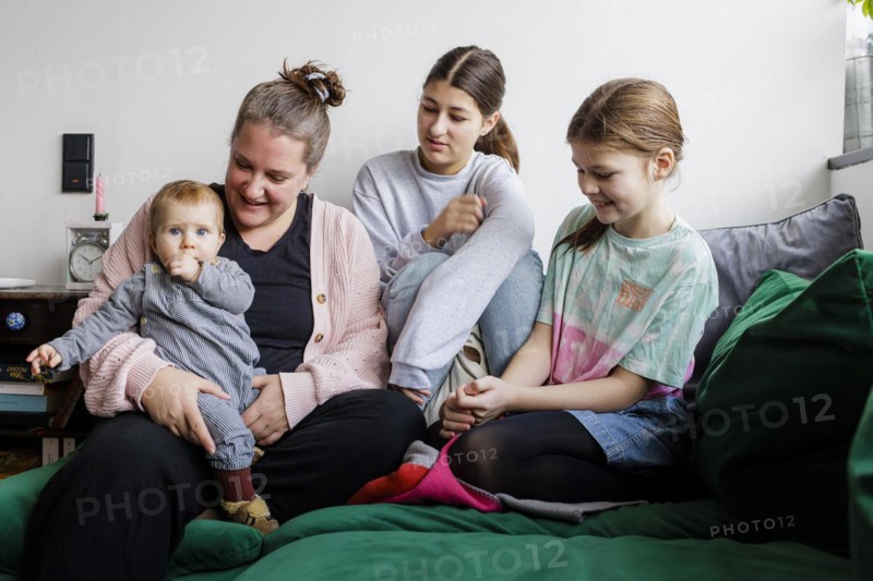Woman with three daughters, Bonn, Germany, Europe