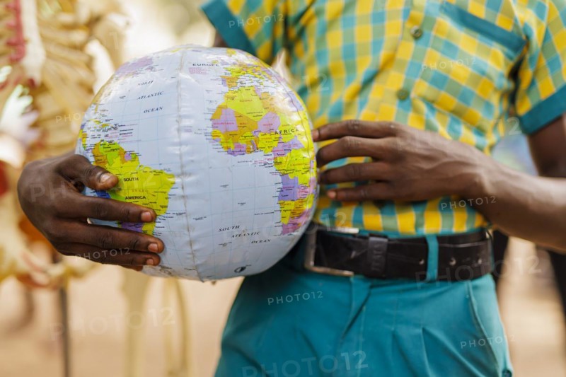 Theme: School children in Africa with an inflatable globe, Krokrobite, Ghana, Africa