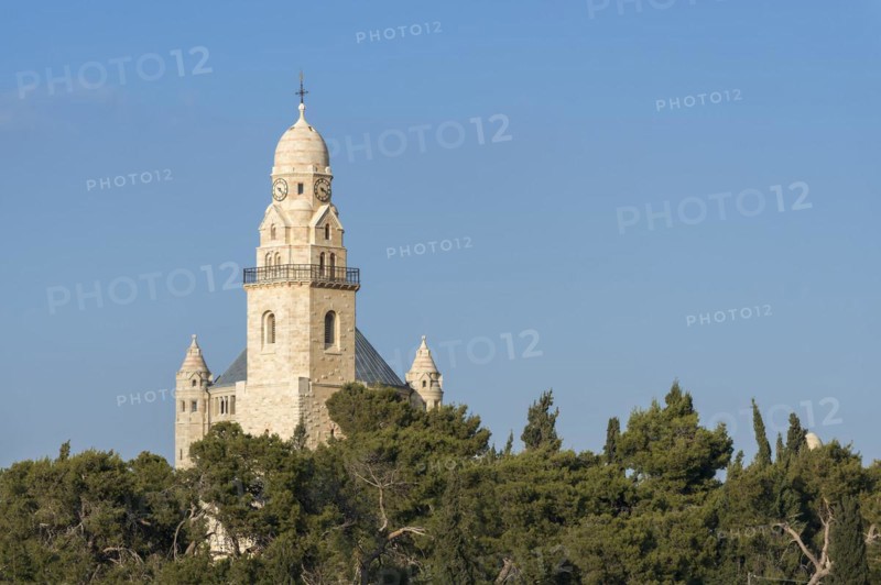 Bell tower of the Dormitio Basilica behind trees on Mount Zion, Jerusalem, Israel, Asia