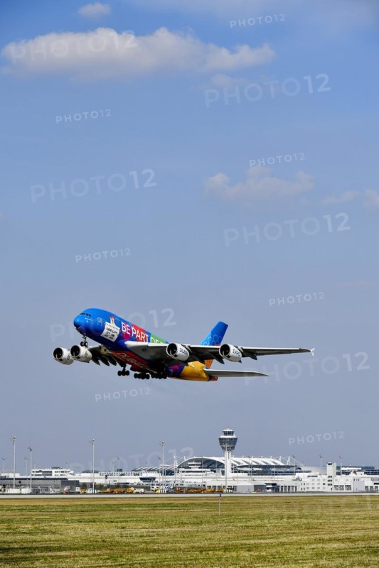 Emirates Airlines special livery Expo Dubai 2021-2022 Airbus A380-800 taking off with tower, Munich Airport, Upper Bavaria, Bavaria, Germany, Europe