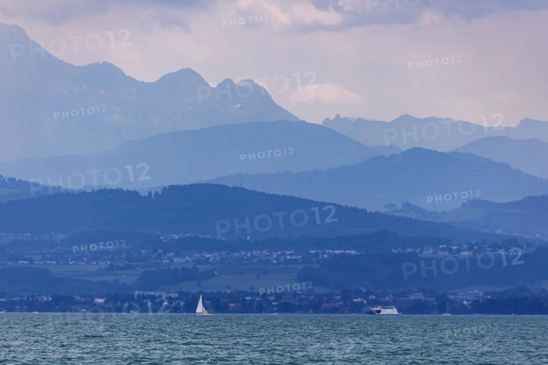 Sailing party on Lake Constance, in the background the Swiss shore, Immenstaad, Baden-Wuerttemberg, Germany, Europe