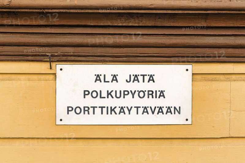 Polite sign on wooden facade, old wooden house, inscription, please do not park bicycles, Finnish, Old Town of Rauma, UNESCO World Heritage Site, Satakunta, Finland, Europe