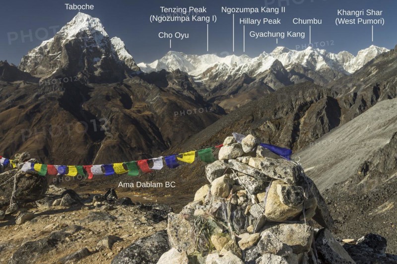 The eight-thousander Cho Oyu, Tenzing Peak and Hillary Peak seen among many other Himalayan mountains from a glacial moraine high above the Ama Dablam Base Camp in the Khumbu Region, the Himalayas. Photo with peak labels. Sagarmatha National Park, a UNESCO World Heritage Site, Everest Region. Solukhumbu, Nepal, Asia
