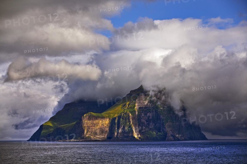 The island of Kalsoy in the North Atlantic with sun and clouds, Faroe Islands, Foroyar, Denmark, Europe