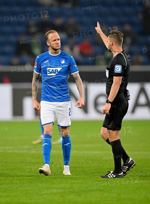 Referee Daniel Schlager signals Kevin Vogt TSG 1899 Hoffenheim