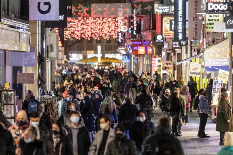 Pre-Christmas period in the Hohe Strasse in Cologne, colourful hustle and bustle during Advent, Cologne, North Rhine-Westphalia, Germany, Europe