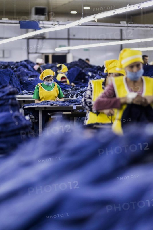 Women workers produce jeans at the Afrasyab jeans factory in Samarkand, 02.11.2022., Samarkand, Uzbekistan, Asia