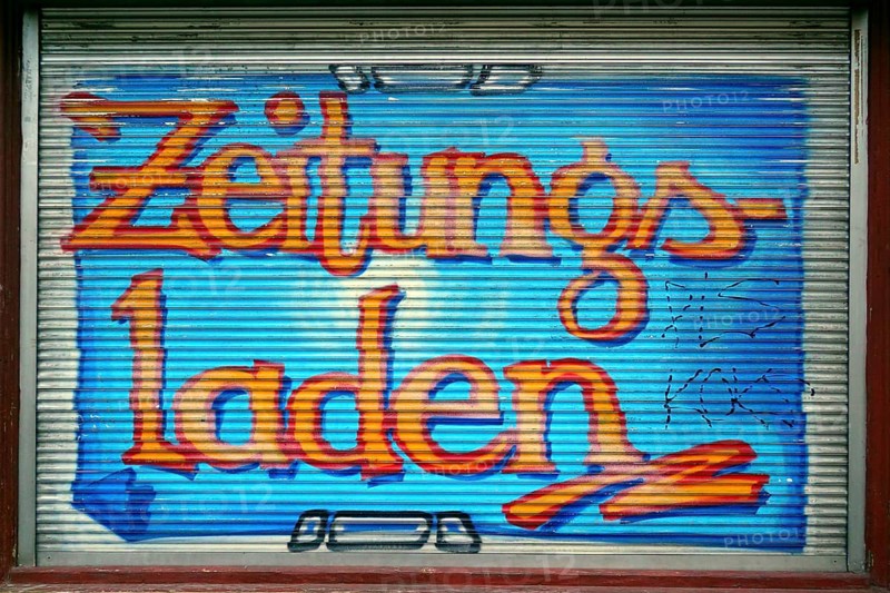 Colourfully painted blind of a shop window at a newspaper shop, Kreuzberg, Berlin, Germany, Europe