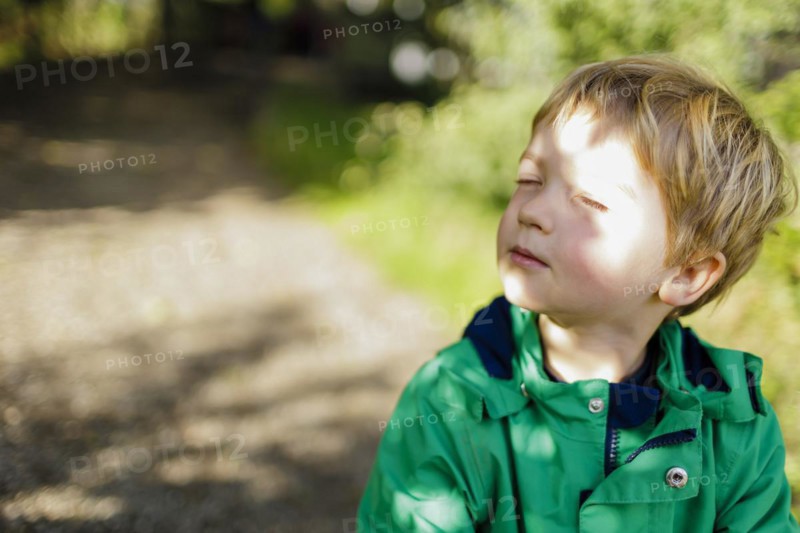 Toddler enjoying autumn sunshine. Bonn, Germany, Europe