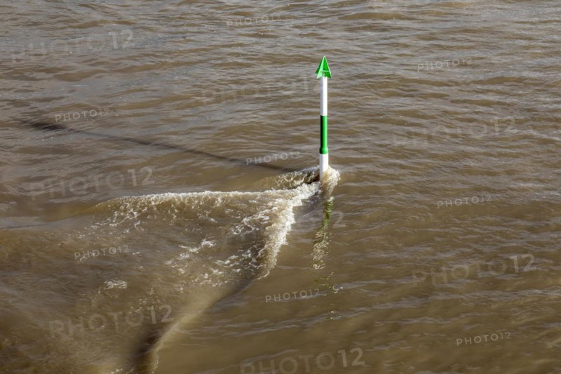 High water on the Rhine, strong current, navigation signs, navigation channel