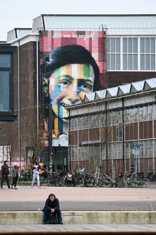 Anne Frank portrait on the facade of the Straat Museum, NDSM Plein, Amsterdam, Netherlands