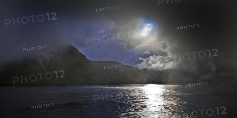 The island of Kalsoy in the North Atlantic with dramatic light mood of sun and clouds, Faroe Islands, Foroyar, Denmark, Europe