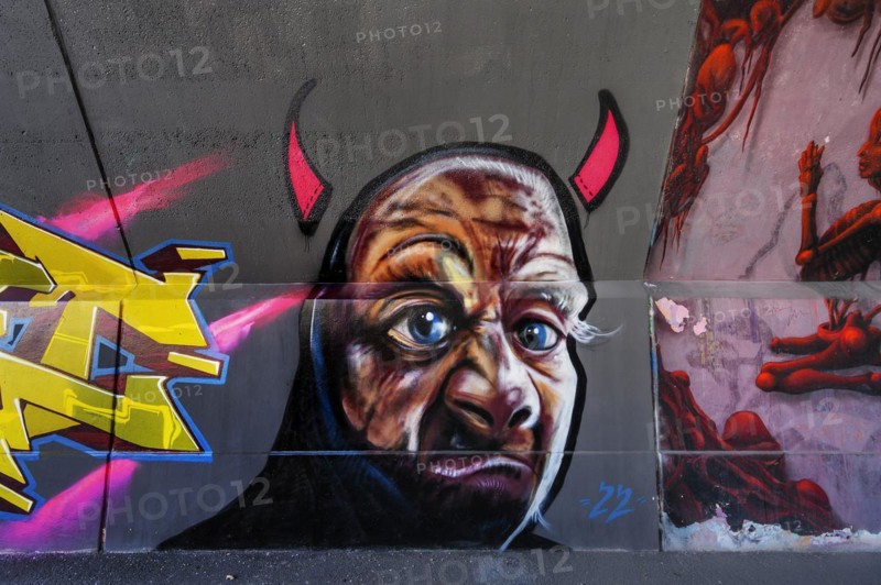 Devils grimace, graffiti in the driveway to Kempten main station, Allgaeu, Bavaria, Germany, Europe