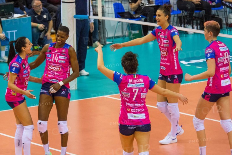 Igor Gorgonzola Novara players cheer after winning a set