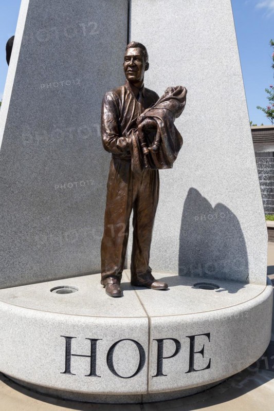 Tulsa, Oklahoma, Hope Plaza at John Hope Franklin Reconciliation Park. The park is a memorial based on the 1921 race massacre in which many African-Americans were murdered and the Greenwood District burned to the ground. The plazas sculpture includes three figures from the race massacre representing Humiliation, Hostility, and Hope