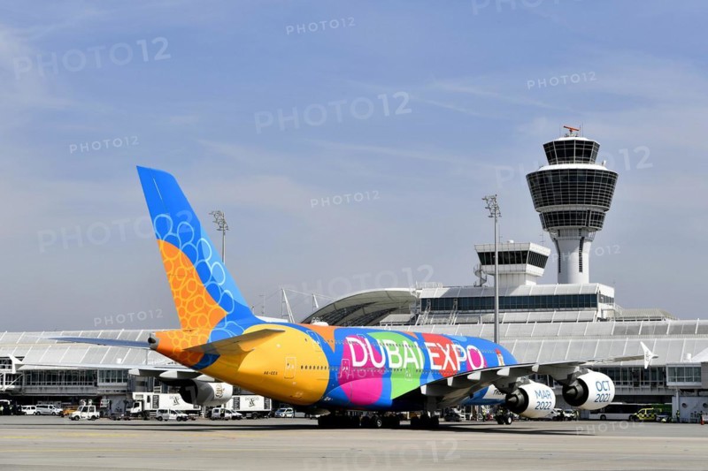 Emirates Airlines special livery Expo Dubai 2021-2022 Airbus A380-800 on position in front of Terminal 1 with tower, Munich Airport, Upper Bavaria, Bavaria, Germany, Europe