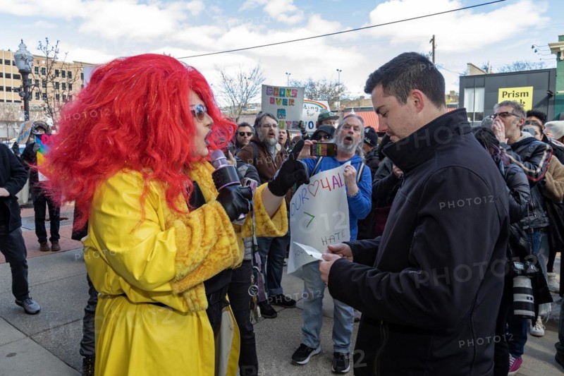 Royal Oak, Michigan USA, 11 March 2023, A small group of conservative Republicans protesting the Sidetrack Bookshops Drag Queen Story Hour were outnumbered by many hundreds of counter-protesters supporting the LGBTQ community. A drag queen debates a protester, who said he would pray for her