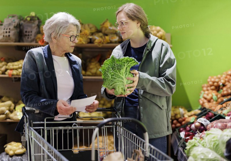Elderly woman shopping in supermarket, Radevormwald, Germany, Europe