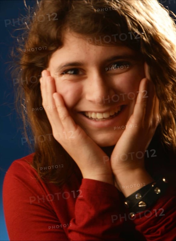 An 11-year-old girl stands as a model, Germany, Europe