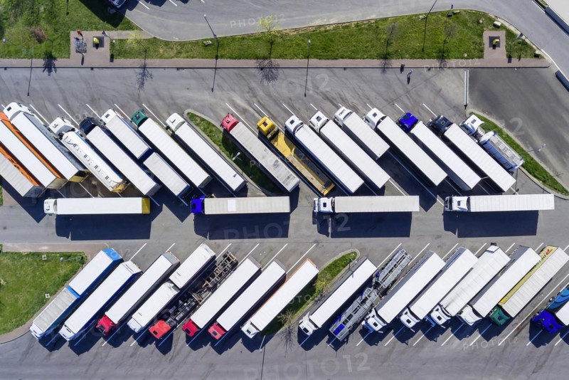 Rest area Denkendorf on the motorway A8, occupied parking spaces for trucks, drivers have to respect their rest periods, drone photo, Denkendorf, Baden-Wuertttemberg, Germany, Europe