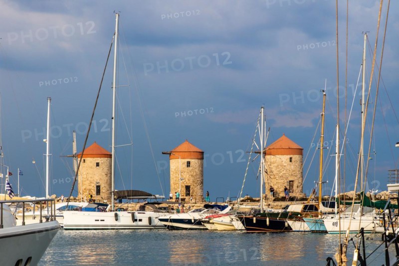 Three windmills on the pier, Mandraki Harbour, Rhodes Town, Greece, Europe