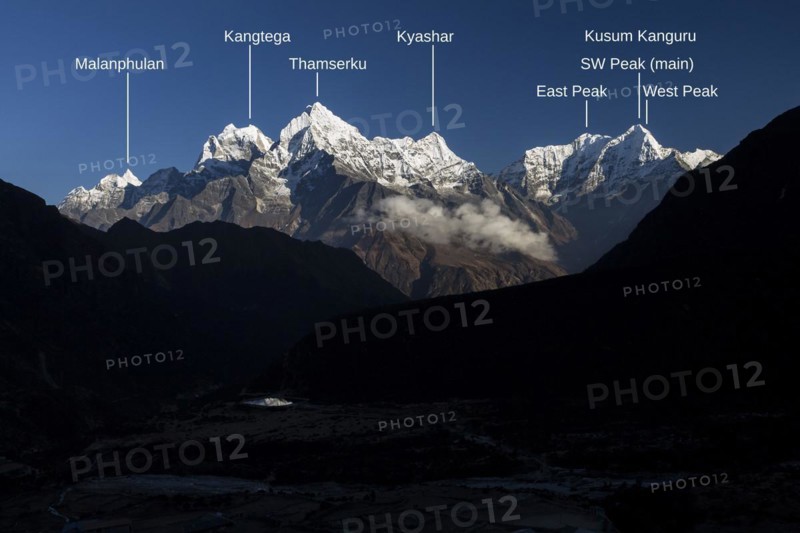 Mountain panorama seen from Thame village on an autumn evening with some high Himalayan peaks, including Malanphulan, Kangtega, Thamserku, Kusum Kanguru. Three Passes Trek. Photo with peak labels. Khumbu, the Everest Region, Himalayas. Sagarmatha National Park, a UNESCO World Heritage Site. Solukhumbu, Nepal, Asia