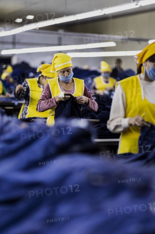 Women workers produce jeans at the Afrasyab jeans factory in Samarkand, 02.11.2022., Samarkand, Uzbekistan, Asia