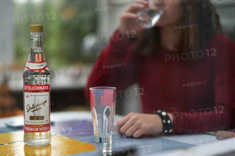 An 11-year-old girl stands as a model. Symbol photo alcoholism, Germany, Europe