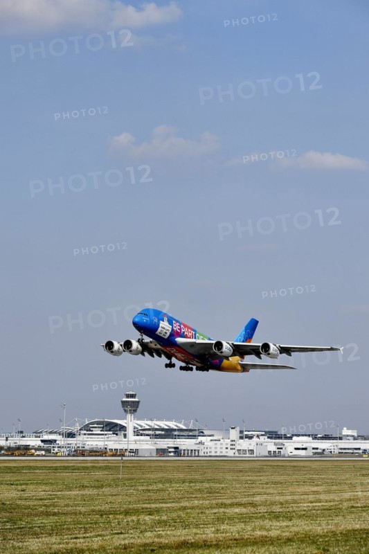 Emirates Airlines special livery Expo Dubai 2021-2022 Airbus A380-800 taking off with tower, Munich Airport, Upper Bavaria, Bavaria, Germany, Europe