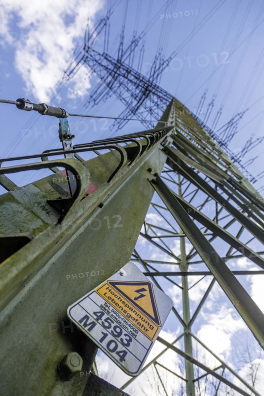 High voltage danger to life, warning sign on an overhead line electricity pylon, Duisburg, North Rhine-Westphalia, Germany, Europe