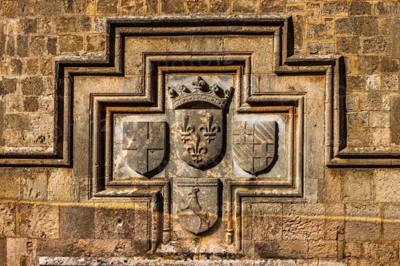 Coat of arms on the French hostelKnights Street in Old Town from the time of the Order of St. John, the only surviving 16th century street in the late Gothic style, Oddos Ippoton, Rhodes Town, Greece, Europe